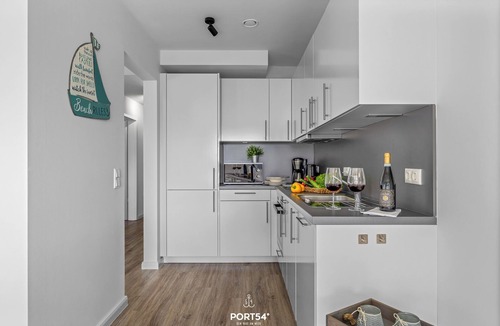 Damp Apartment | Küstenglück - Shower room, covered balcony, garden furniture, TV, parking space