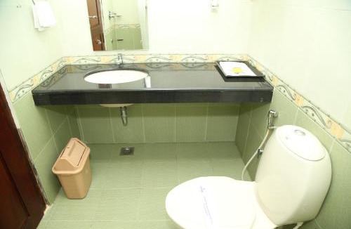 Irinjalakuda Hotel | Kallada Residency
