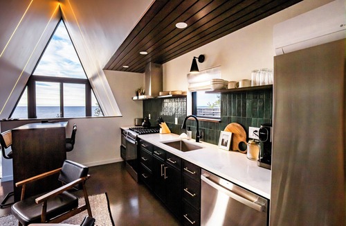 Tofte Cabin | Kalliot: Lakefront Tiny A-Frame w/Barrel Sauna + EV Charger