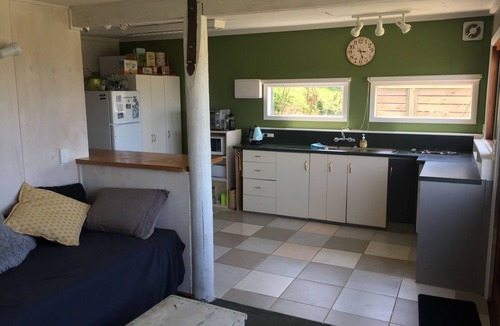Karitane Cottage | Karitane Crib with water view