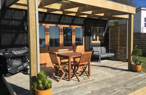 Karitane Cottage | Karitane Crib with water view