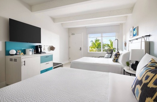 New Town Hotel | Key West Cool | Chill Days, Fun Nights, Poolside Drinks & Lawn Games