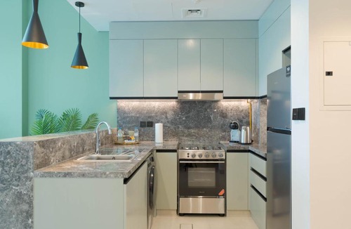 Dubai Apartment | KeyRock Golf Gate - Stylish Retreat with Pool and Gym