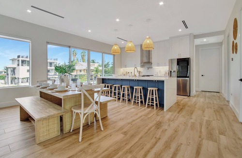 Pirates Cove House | Keys Casa: Elegant Waterfront Retreat, Sleeps 16, Elevator, Private Dock, Putt-Putt