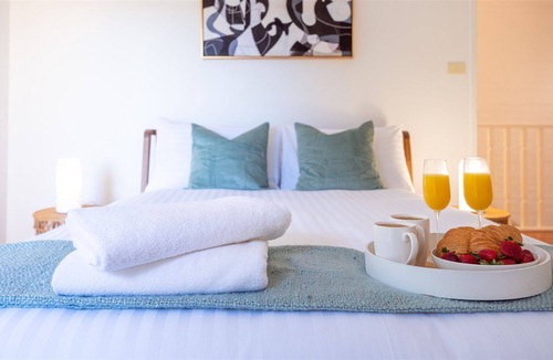 Kiama Villa | Kiama Haven - stunning views of Easts Beach, the ocean and the hills of the Kiama Coastal Walk.