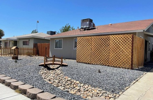 Coalinga House | Kick back in this calm, stylish 2-bedroom home in the heart of Coalinga. Perfect for families or professionals, it features a dedicated workspace, a fully equipped kitchen, and a bright living area.