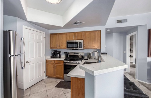 Maryvale Condo | KING Beds, Heated Community Pool! 3 miles from Cardinal Stadium!