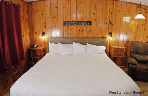 Florence Hotel | King Standard: Rustic Knotty Pine Retreat w/Recliner & Nature Vibes