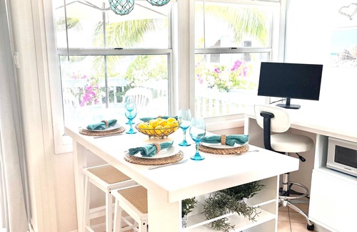 Kittian Village Condo | Seaside Charm: Steps to Beach, Bars, Taxi & Island Fun!