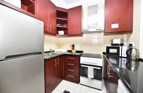 Discovery Gardens Apartment | KND - Studio with a Garden View