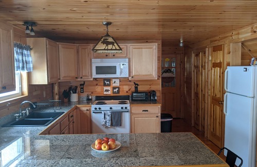 Oquossoc House | Knotty Pine Home- 2 Min Walk to Lake and Dock