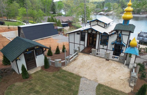Alpine Bay House | Lake Front Castle with Mini Golf/Pickleball/Arcade/Sleeps 18