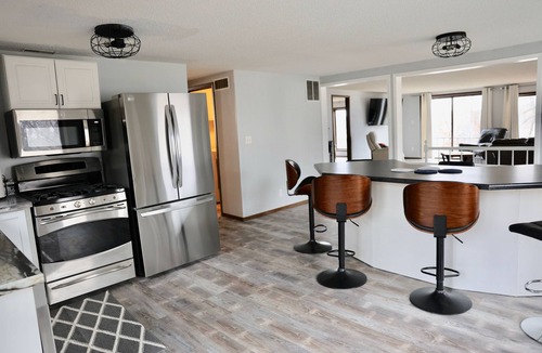 Arnolds Park House | Lake front, HUGE yard and deck, walking distance to the heart of Okoboji