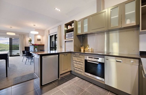 Lake Hayes Apartment | Lake Hayes retreat offers breathtaking mountain and lake views with modern amenities.