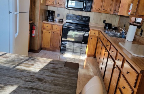 Tiptonville Cabin | lake shower house with private boat dock free coffee wifi parking boat parking.