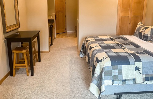Three Lakes Condo | Lake-view studio with hot tubs, heated indoor pool, tennis, gym, grills, firepit