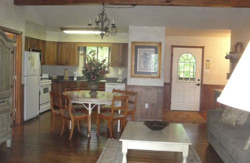 Mount Ida Cottage | Lake view three bedroom, three bath cottage with hot tub overlooking Lake Ouachita. by RedAwning