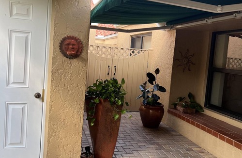Pelican Bay House | Lakefront 3 bedroom, 2 bath home in gated community. Walking distance to beach.