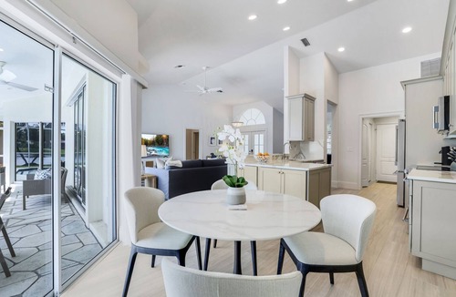 Central Naples House | Lakefront 3-bedroom pool house in Briarwood. Morning sunrise!