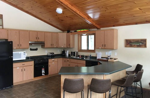Eagle River Cottage | Lakefront -4 acres of private land - 6 Bedrooms - 2 kitchens - Dog Friendly!