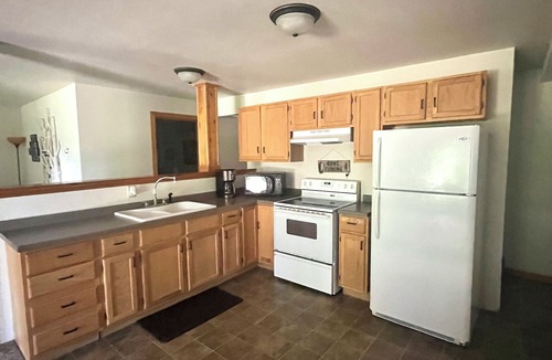 Eagle River Cottage | Lakefront -4 acres of private land - 6 Bedrooms - 2 kitchens - Dog Friendly!