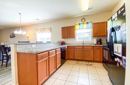 North Myrtle Beach Condo | Lakefront at Barefoot Resort w Massive Waterfront Pool Close to Beach
