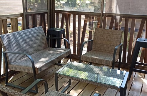 Labouheyre Ski Chalet | Lakefront chalet with pool, air conditioning, and parking