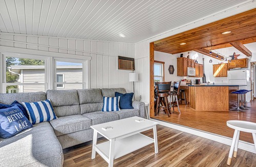 Hingham House | Lakefront Cottage with kayaks, paddleboat, aqua mat, & BIG deck close to Elkhart