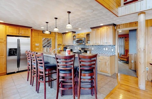 Norway House | Lakefront, dog-friendly home with dock, kayaks, SUPs, canoe, huge deck & firepit