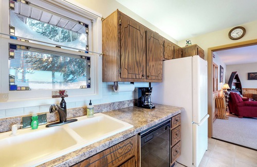 Phelps House | Lakefront, dog-friendly home with beach access, kayaks and firepit
