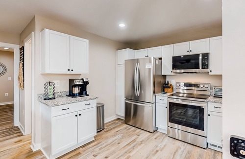 Mineral House | Lakefront, dog-friendly home with dock, paddleboards & firepit