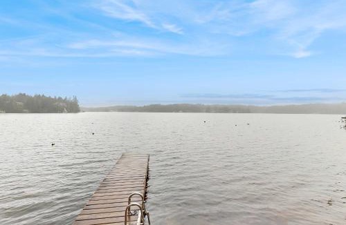 Dunes City House | Lakefront dream with private hot tub dock kayaks pedal boat & amazing views