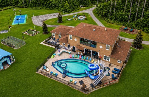 Clermont House | Lakefront Estate · Pool & Waterslide · Sleeps 45