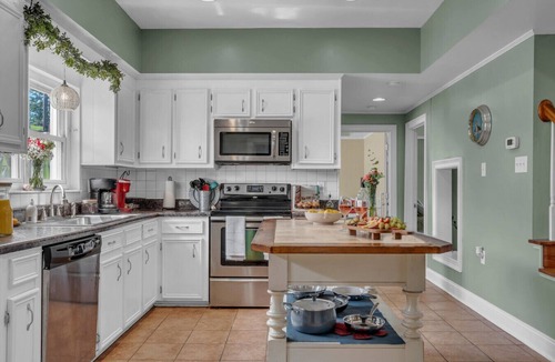 Greenwood House | Lakefront Getaway with Dock, Pool, Sunset Games