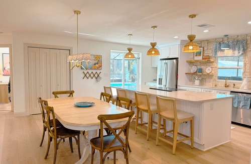 Winter Haven House | Lakefront Heated Pool Home w/Hot Tub, Dock & Sunset Views Near LEGOLAND