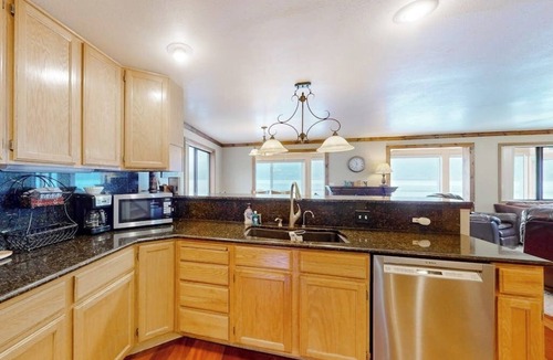 Bonner County Cabin | Lakefront hideaway with games, grill, smart TVs, mountain views, & AC