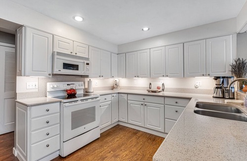 Olympia House | Lakefront home with canoe, kayaks, large deck, beach access, fireplace, & W/D