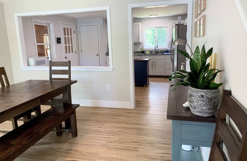 Alton Bay House | Lakefront home with deck, game room, washer/dryer, grill, dock, & views