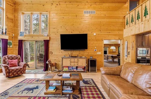 Conover House | Lakefront home with game rooms, dock, kayaks, private beach, fireplace, firepit