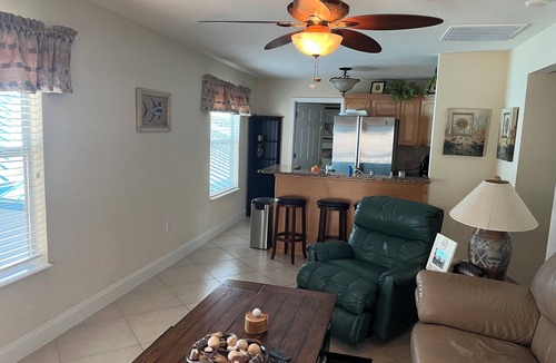 Babson Park House | Lakefront home with white sand beach and private boat dock on Crooked Lake.