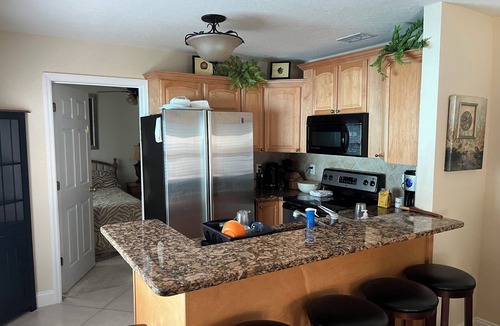 Babson Park House | Lakefront home with white sand beach and private boat dock on Crooked Lake.