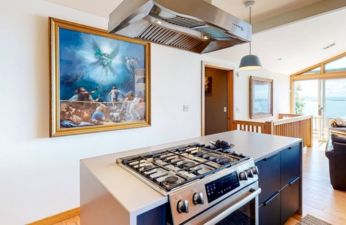 Schuyler Falls House | Lakefront home with fireplace, deck, patio, kayaks, and small beach