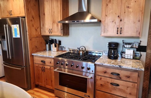 Joseph House | Lakefront home with wraparound deck, modern appliances, WiFI & dog-friendly