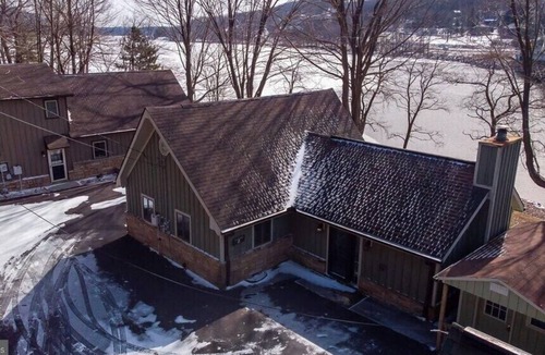 McHenry Cottage | Lakefront house with great kitchen, fireplace, and deck.