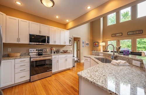 McHenry House | Lakefront Luxury Chalet w/Hot Tub & Dock