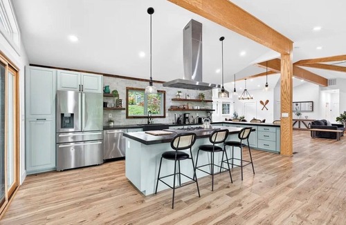 Gainesville House | Lakefront- NEW hot tub, dock, game room, firepit, pedal boat, kayaks