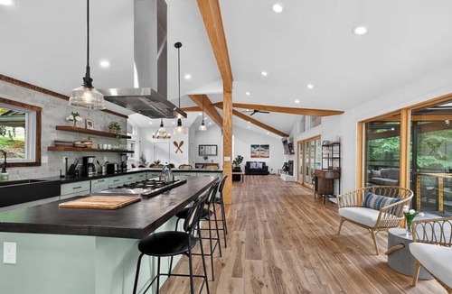 Gainesville House | Lakefront- NEW hot tub, dock, game room, firepit, pedal boat, kayaks