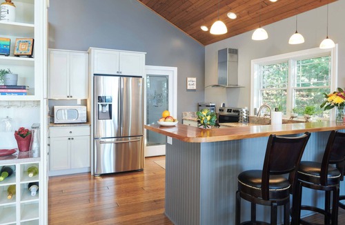 Mecosta House | Lakefront Oasis with Game Room and Hot Tub