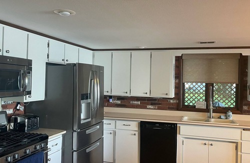 Mosinee House | Lakefront on Dubay Sleeps 13 Firepit Sauna Ski Kayak Outdoor Bar Sunsets