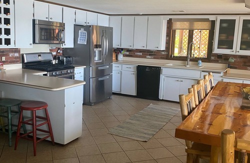 Mosinee House | Lakefront on Dubay Sleeps 13 Firepit Sauna Ski Kayak Outdoor Bar Sunsets